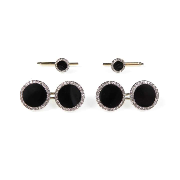 Art Deco onyx and diamond gentleman's dress set comprising pair of cufflinks and two studs, round onyx panels with diamond line border